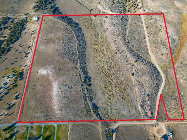 Aerial view of sparsely populated area featuring APPROXIMATE property boundaries highlighted