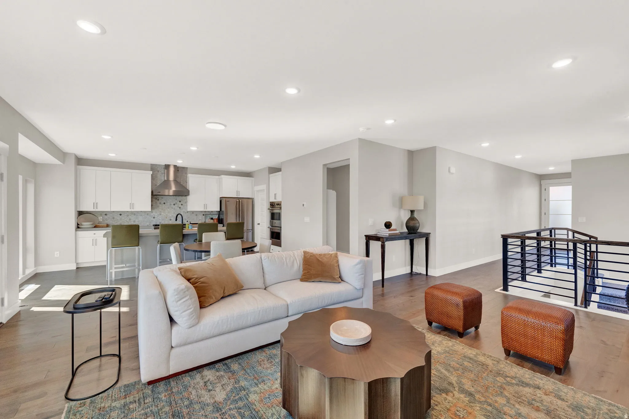 Living room featuring wood finished floors and recessed lighting