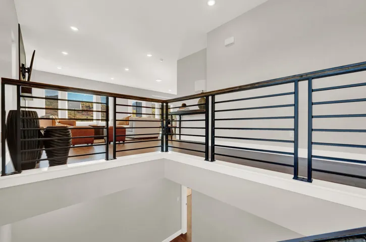 Corridor featuring recessed lighting
