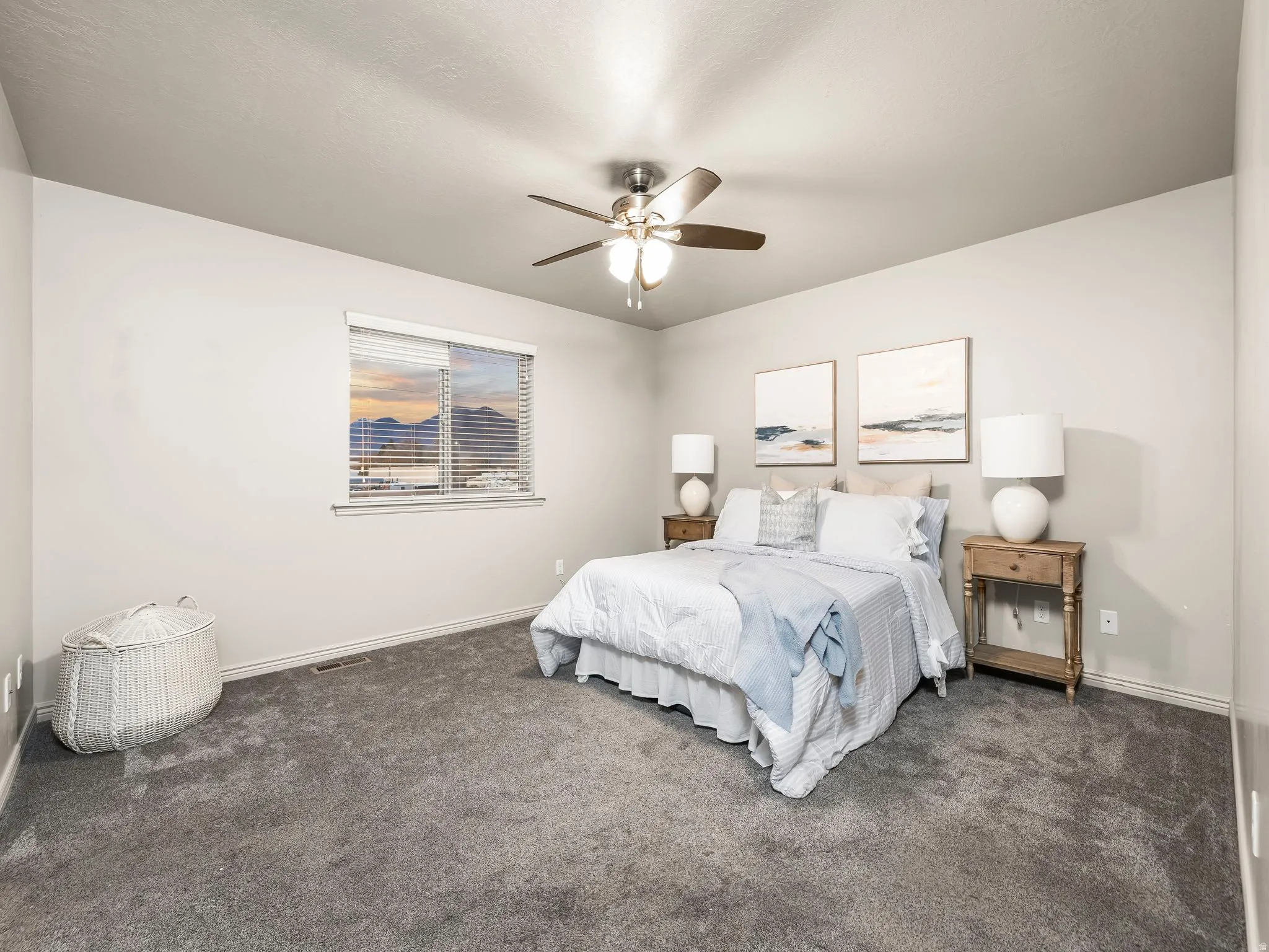 Bedroom featuring carpet and a ceiling fan