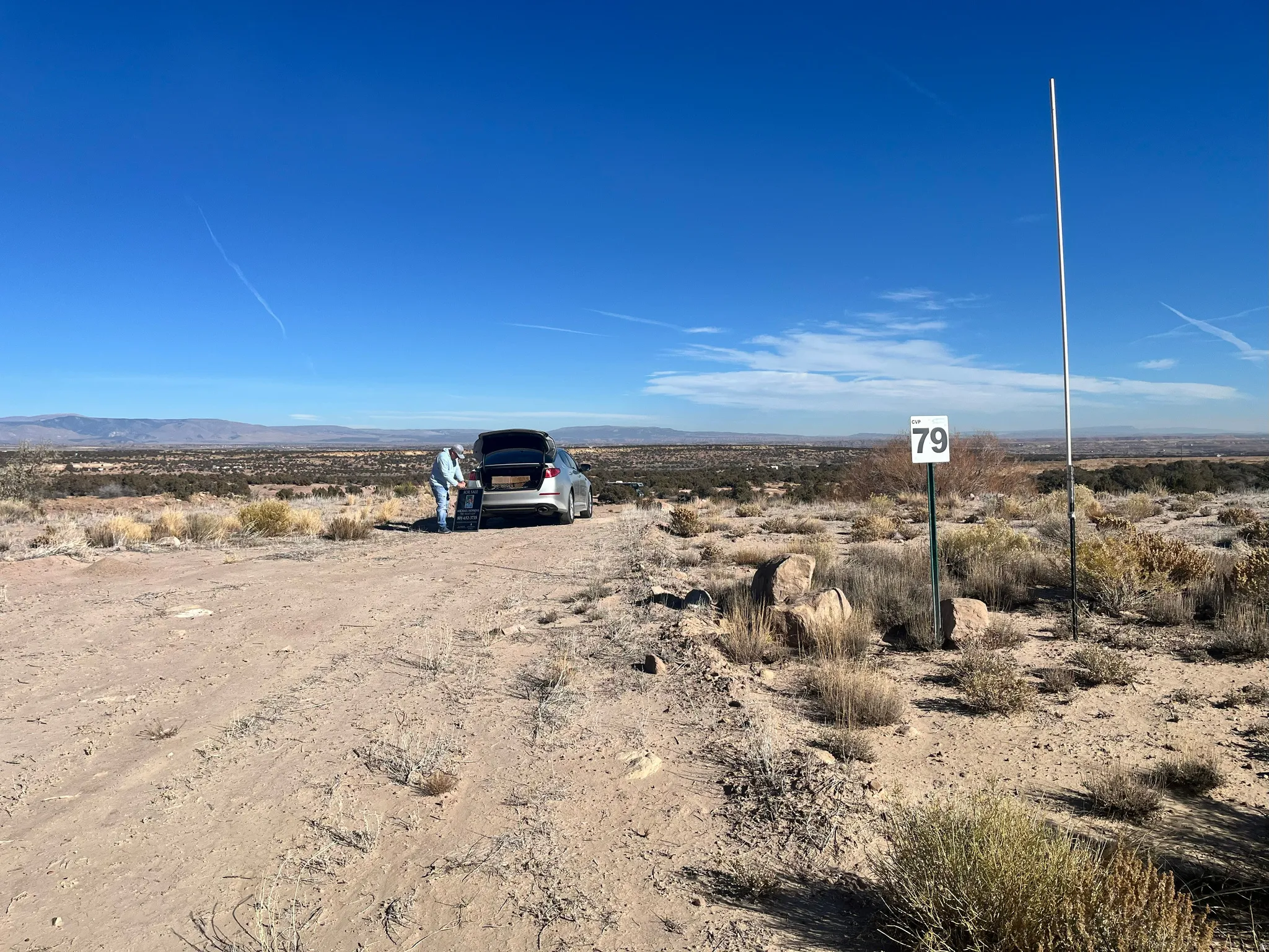 View of dirt / gravel road with a mountain view