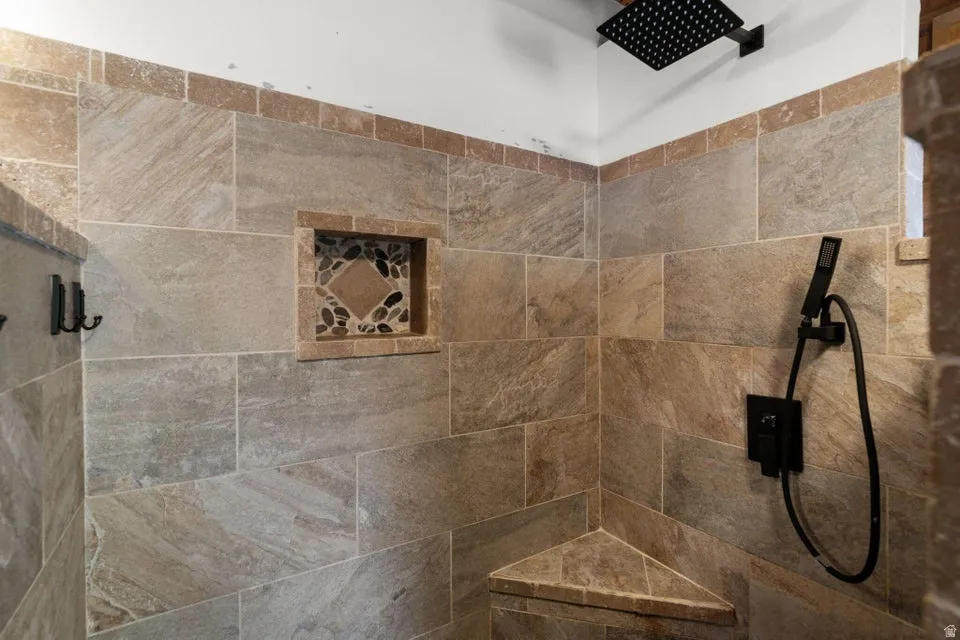 Bathroom with tiled shower