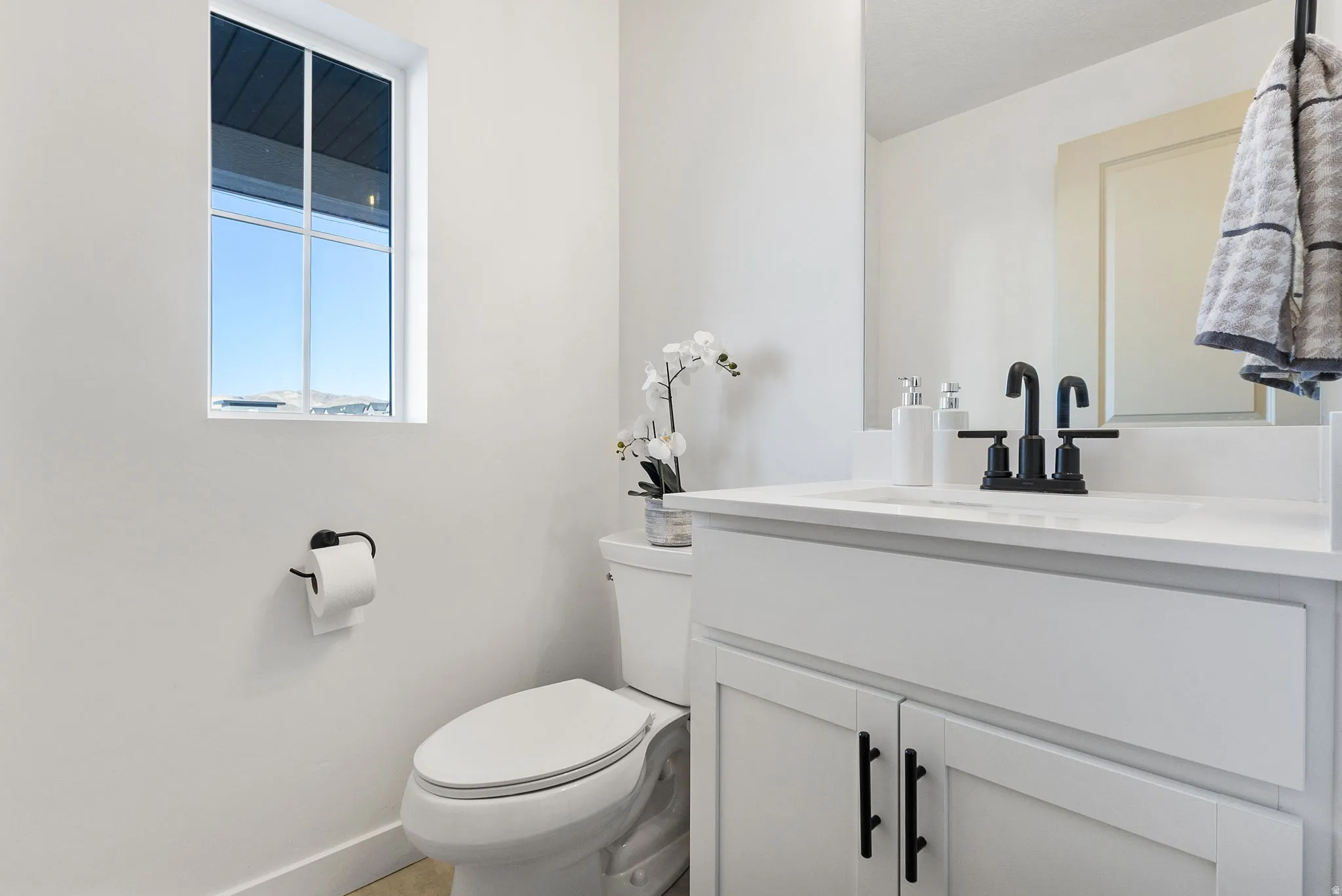 Bathroom with baseboards and vanity