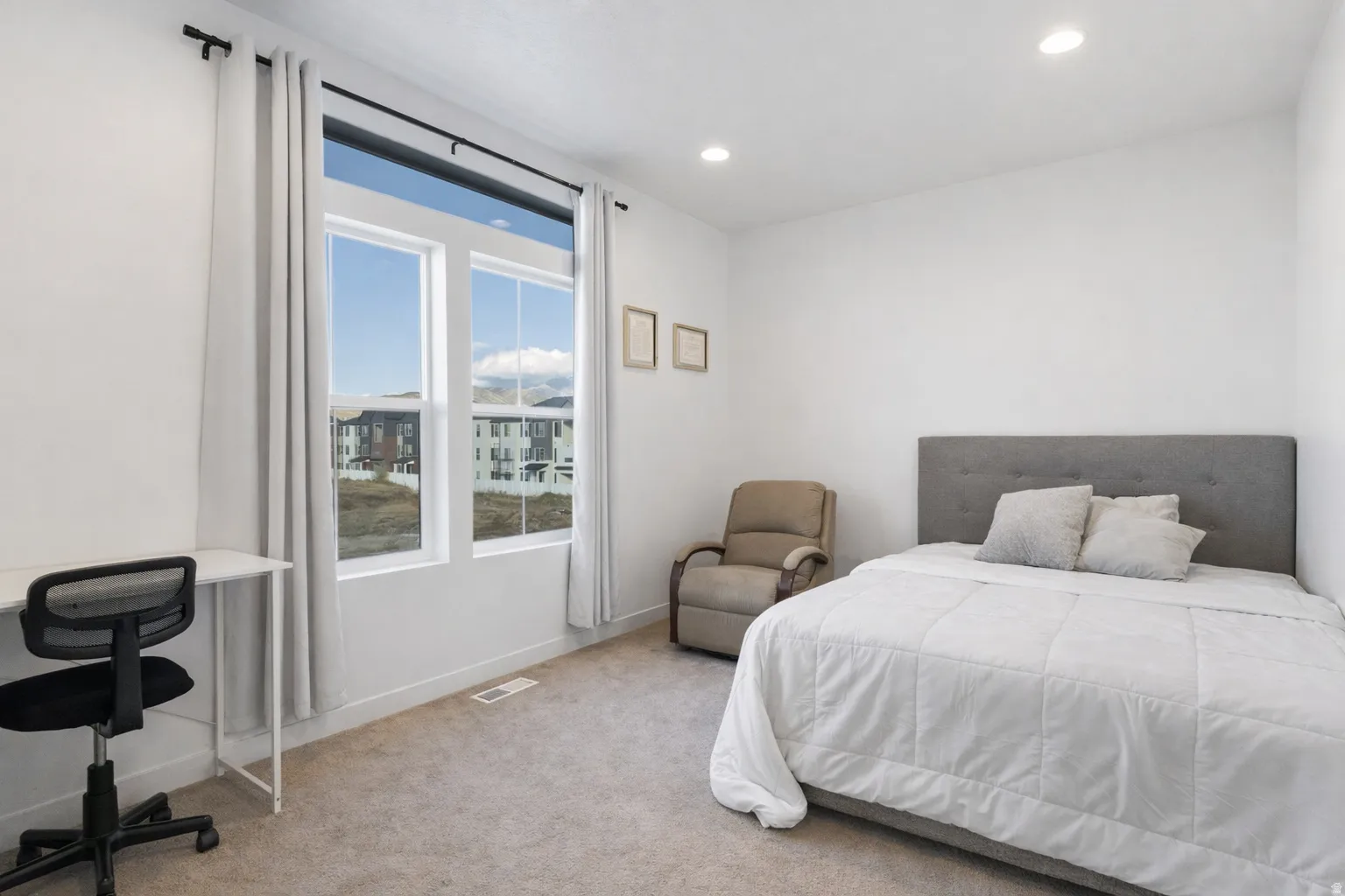 Bedroom featuring carpet flooring and recessed lighting