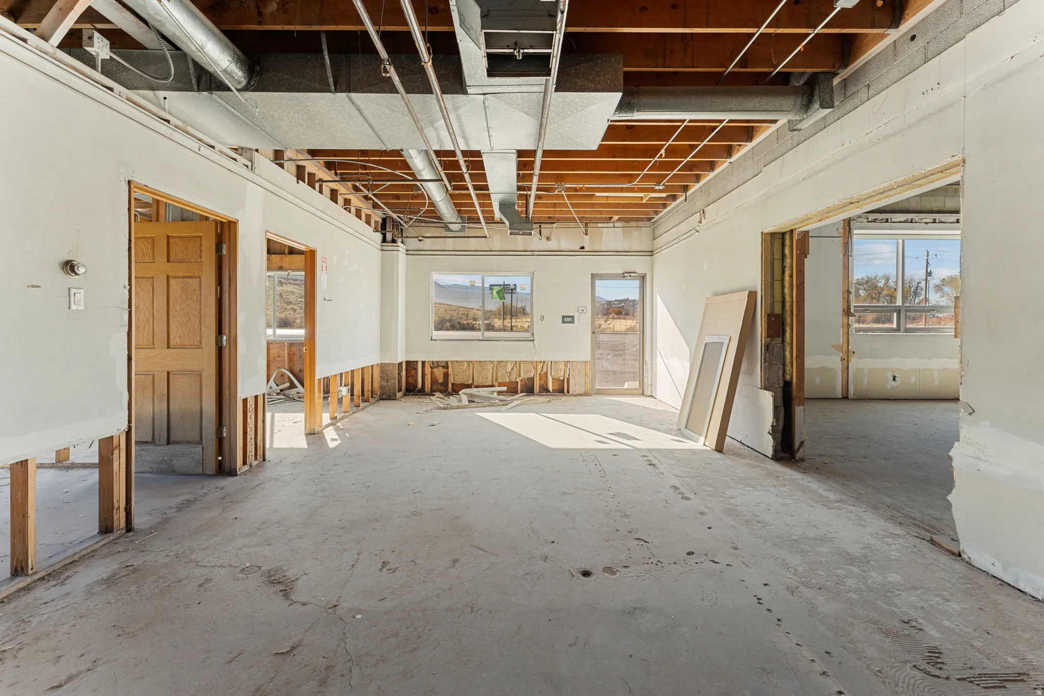 Unfurnished room featuring healthy amount of natural light