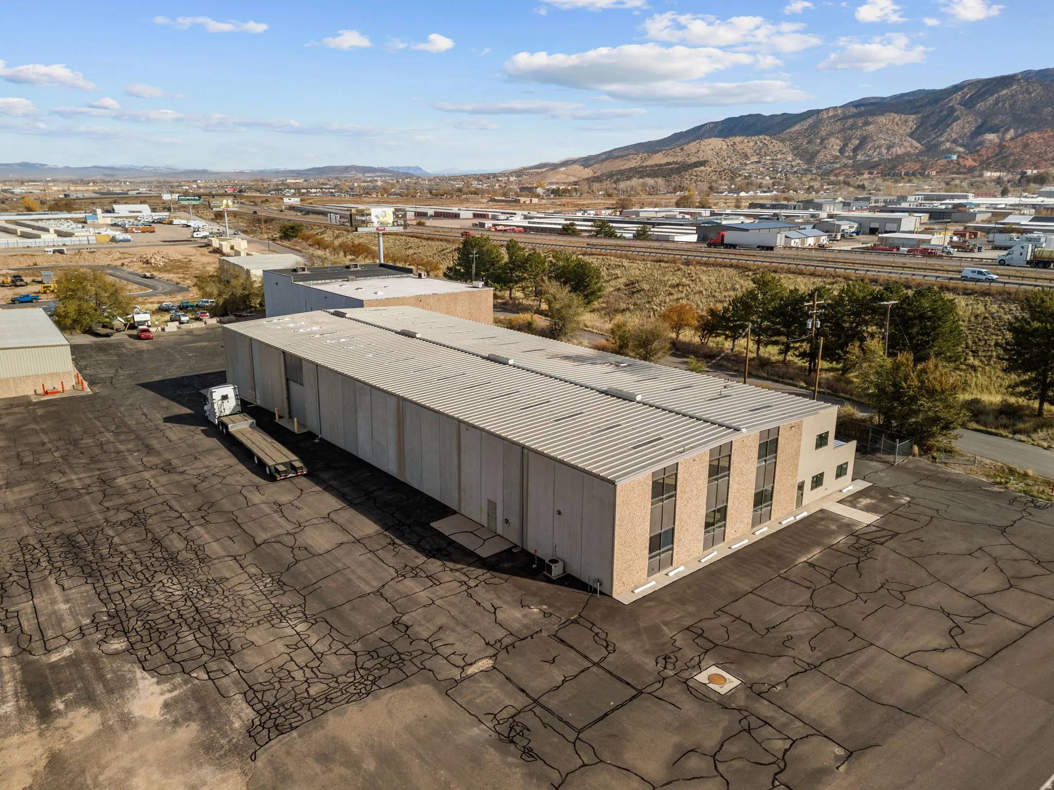 Aerial view of mountains and an industrial area