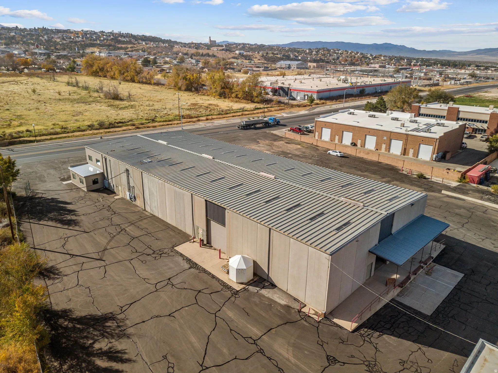 Aerial view of an industrial area and mountains