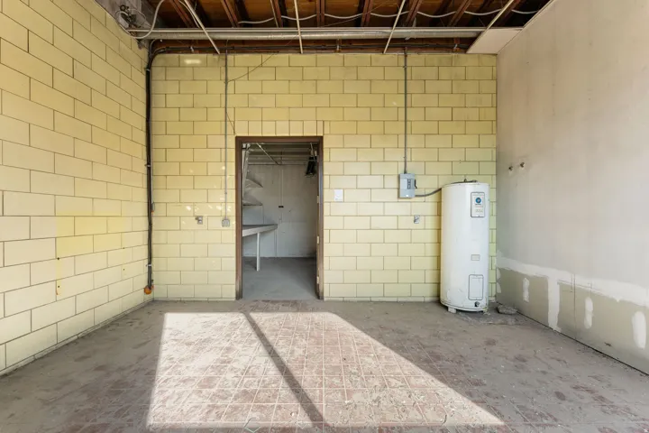 Garage featuring water heater