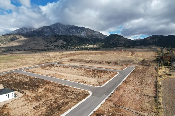 View of mountain background featuring rural landscape