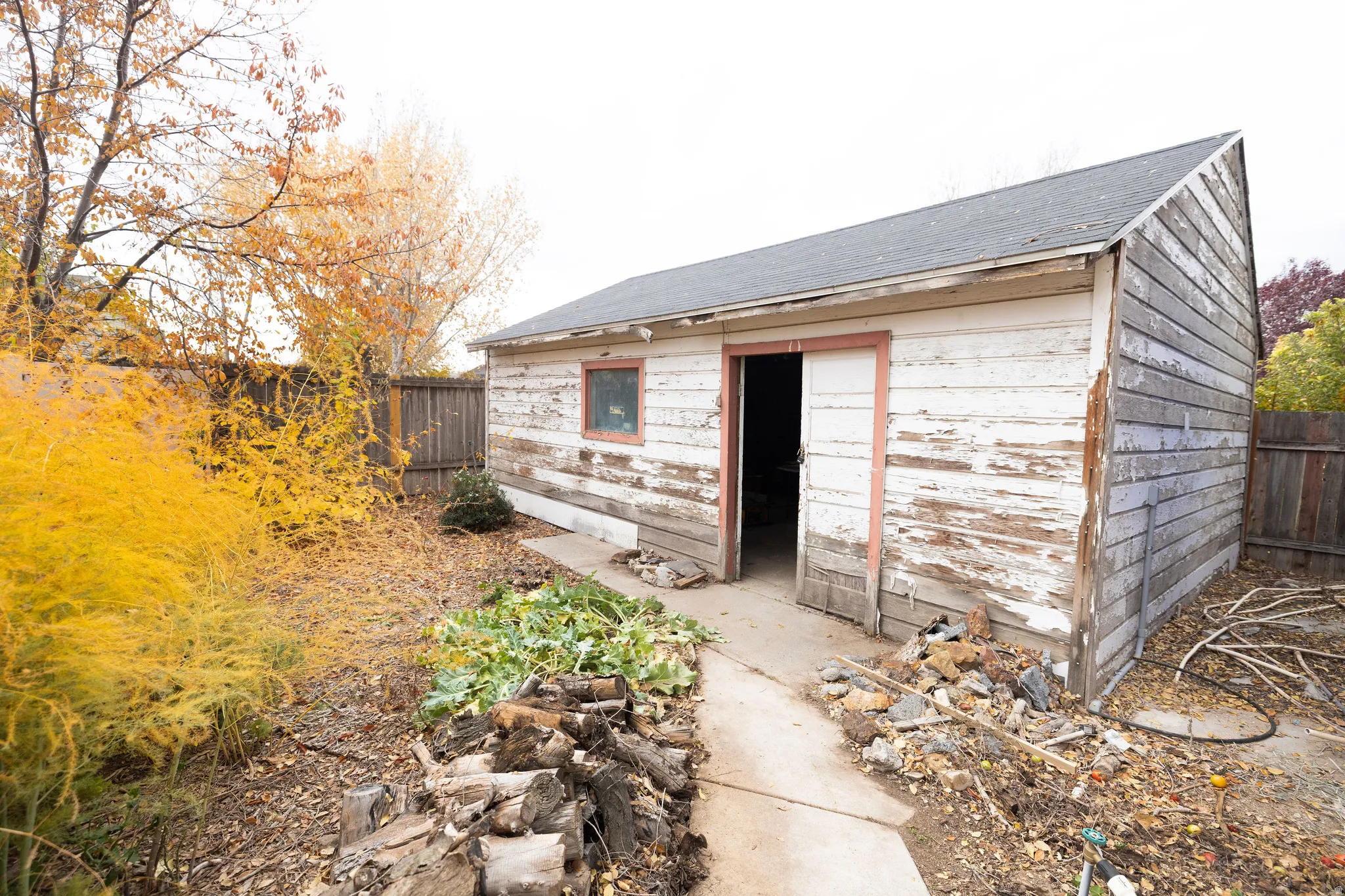 View of outdoor structure featuring a fenced backyard