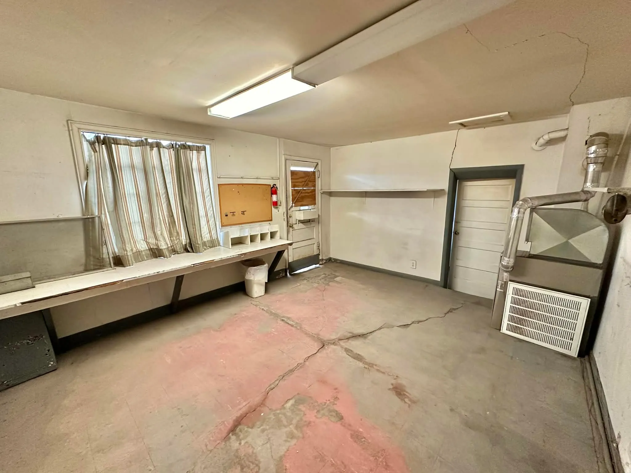Miscellaneous room featuring heating unit