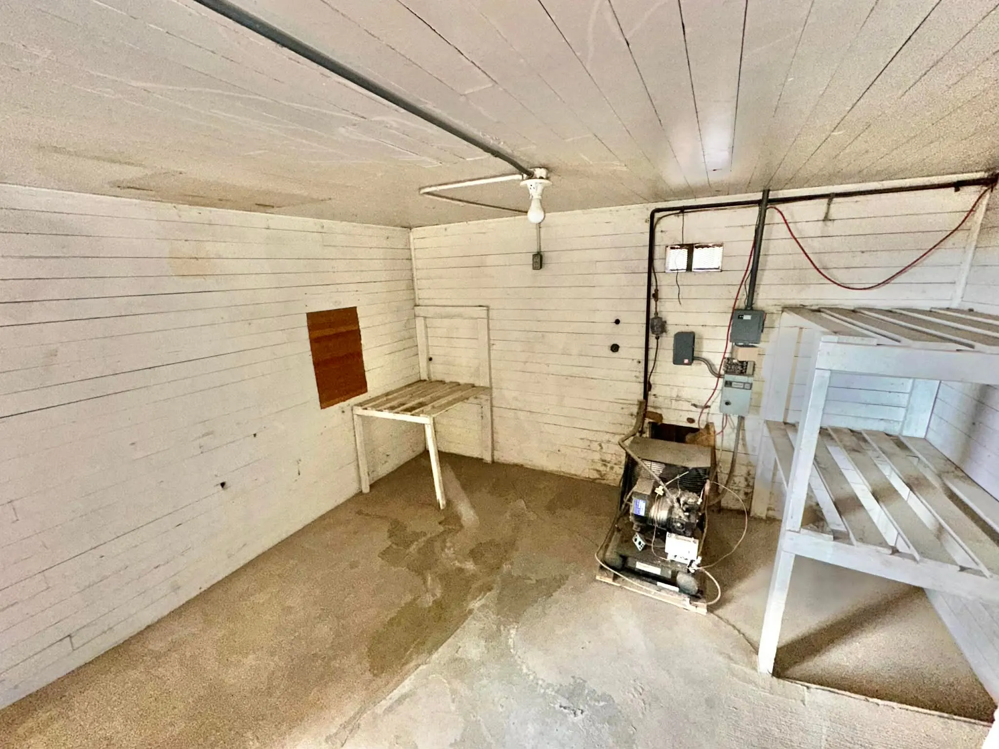 Basement with wooden walls and wood ceiling