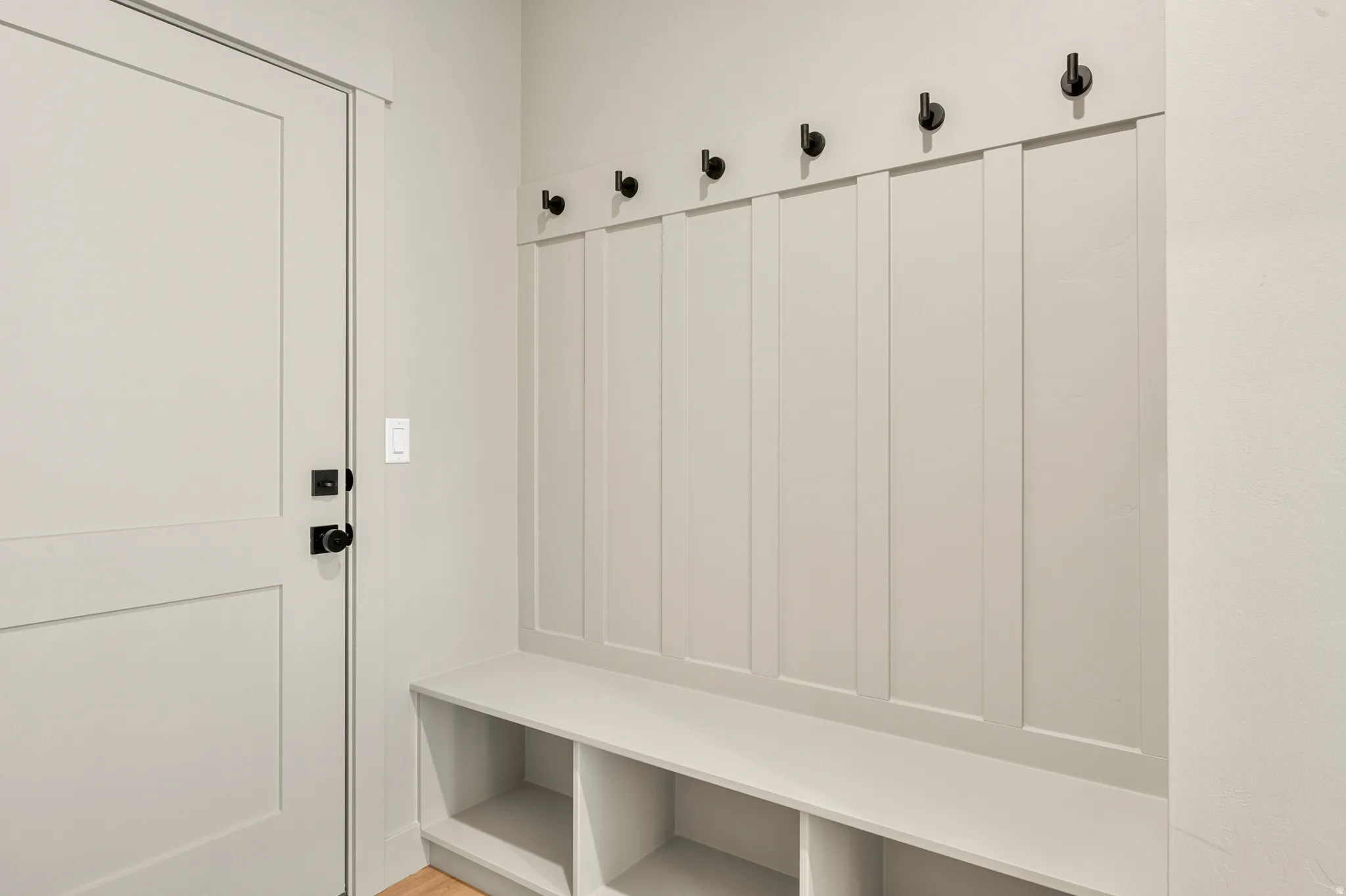 Mudroom featuring wood finished floors