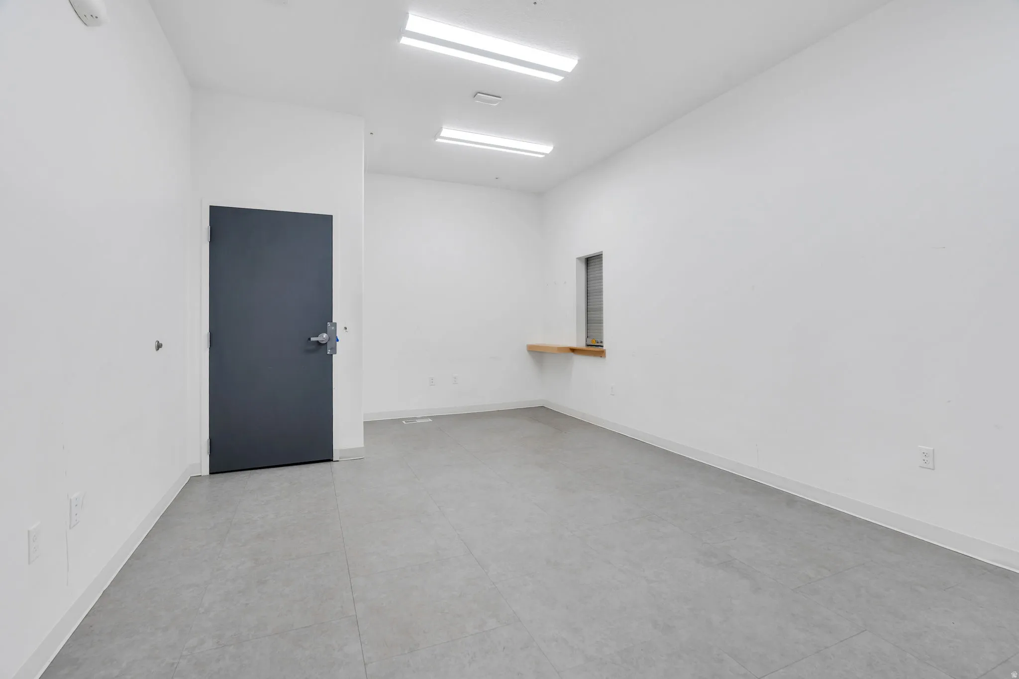 Empty room with baseboards