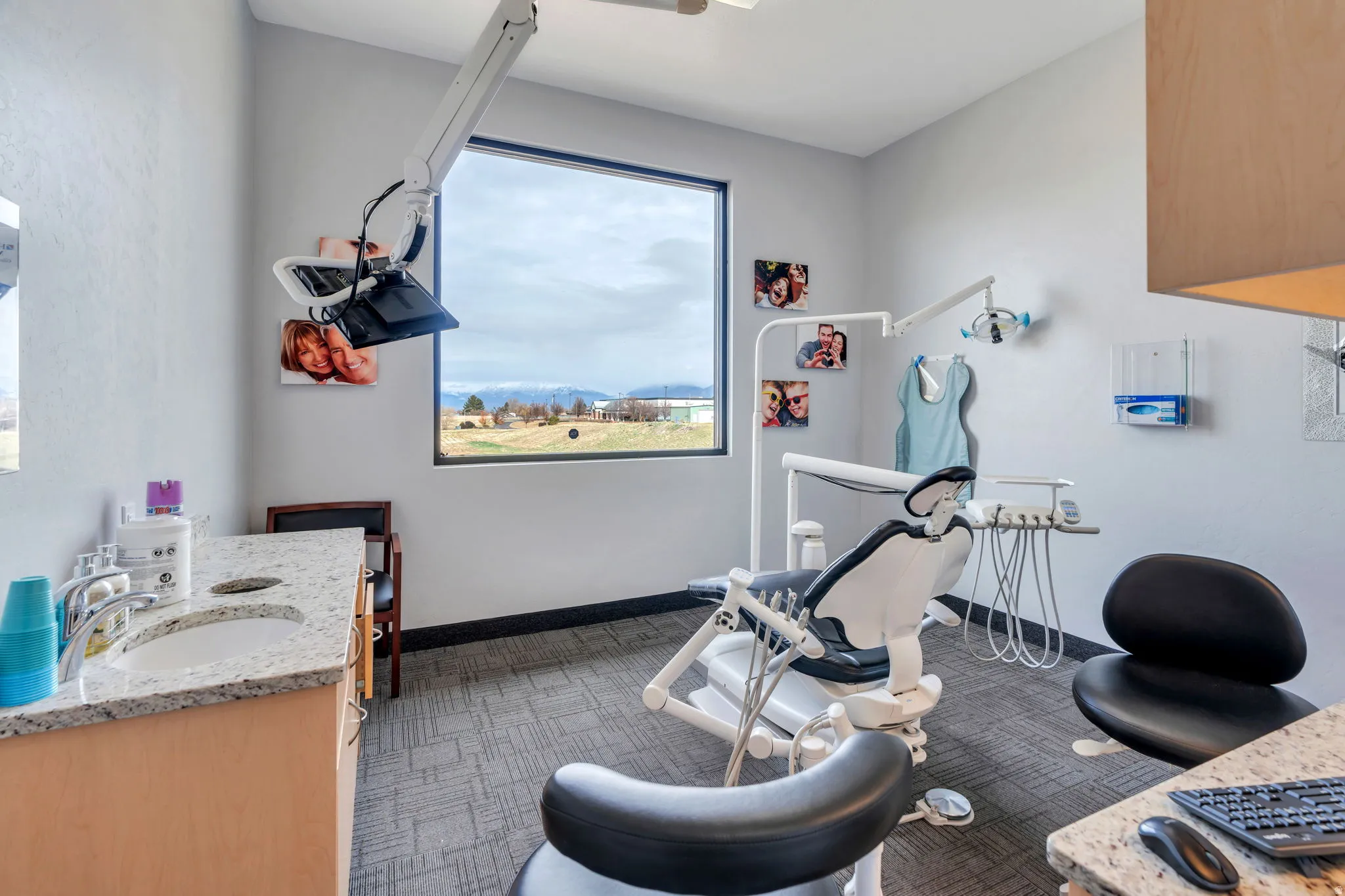 Workout room featuring baseboards and dark carpet