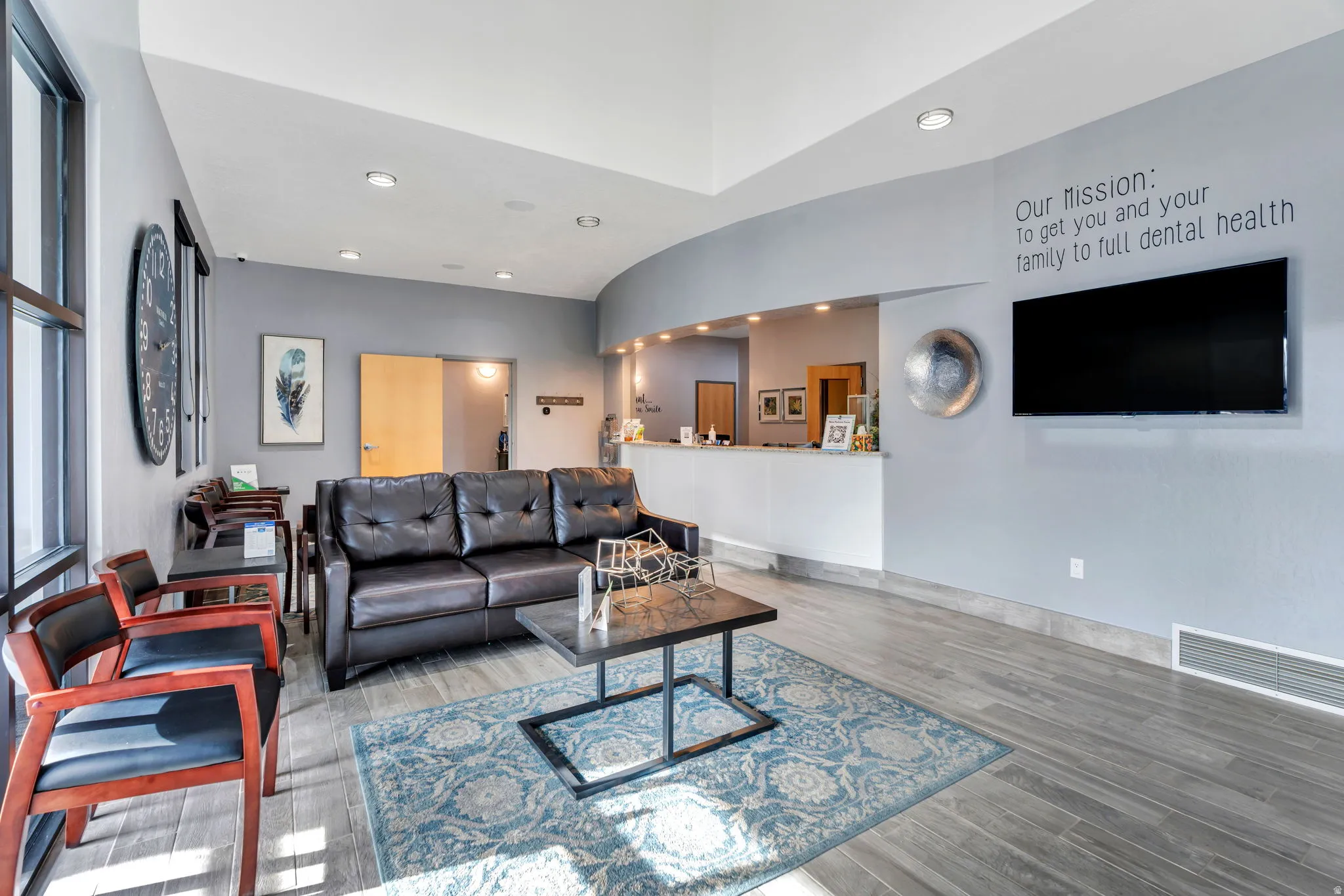 Living area with recessed lighting and wood finished floors