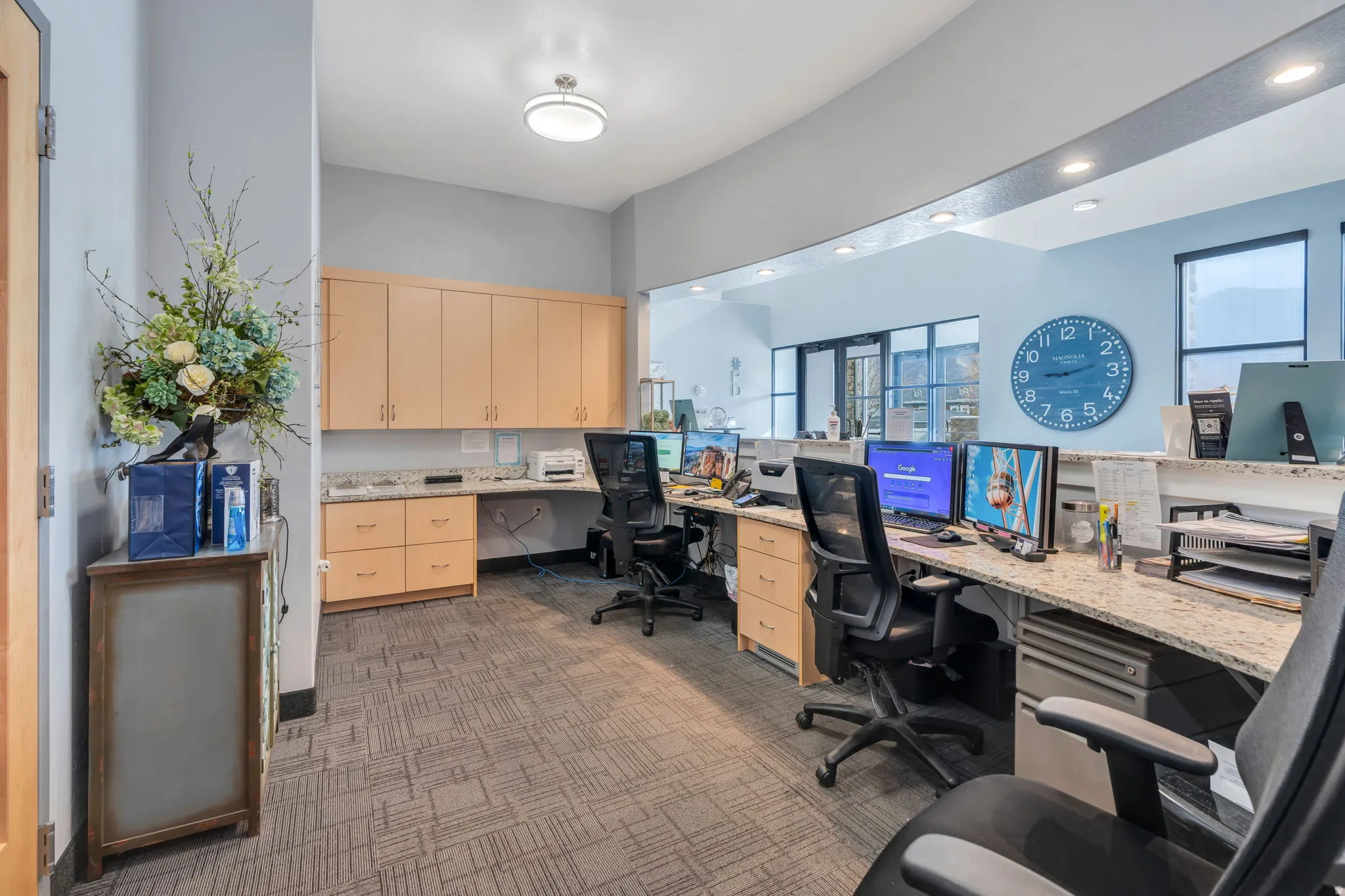 Office with built in study area, dark carpet, and recessed lighting
