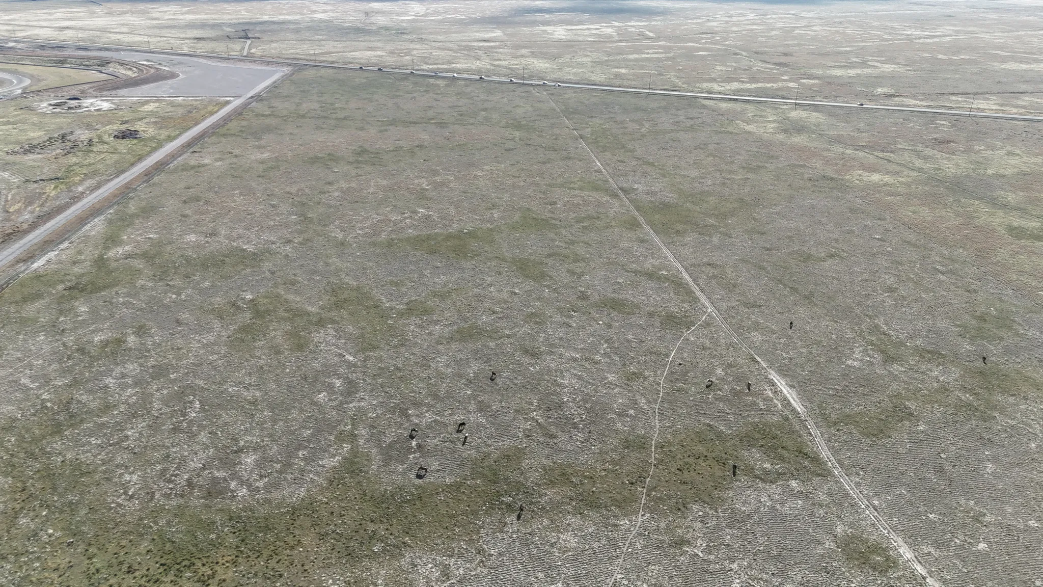 Aerial view of property and surrounding area featuring rural landscape