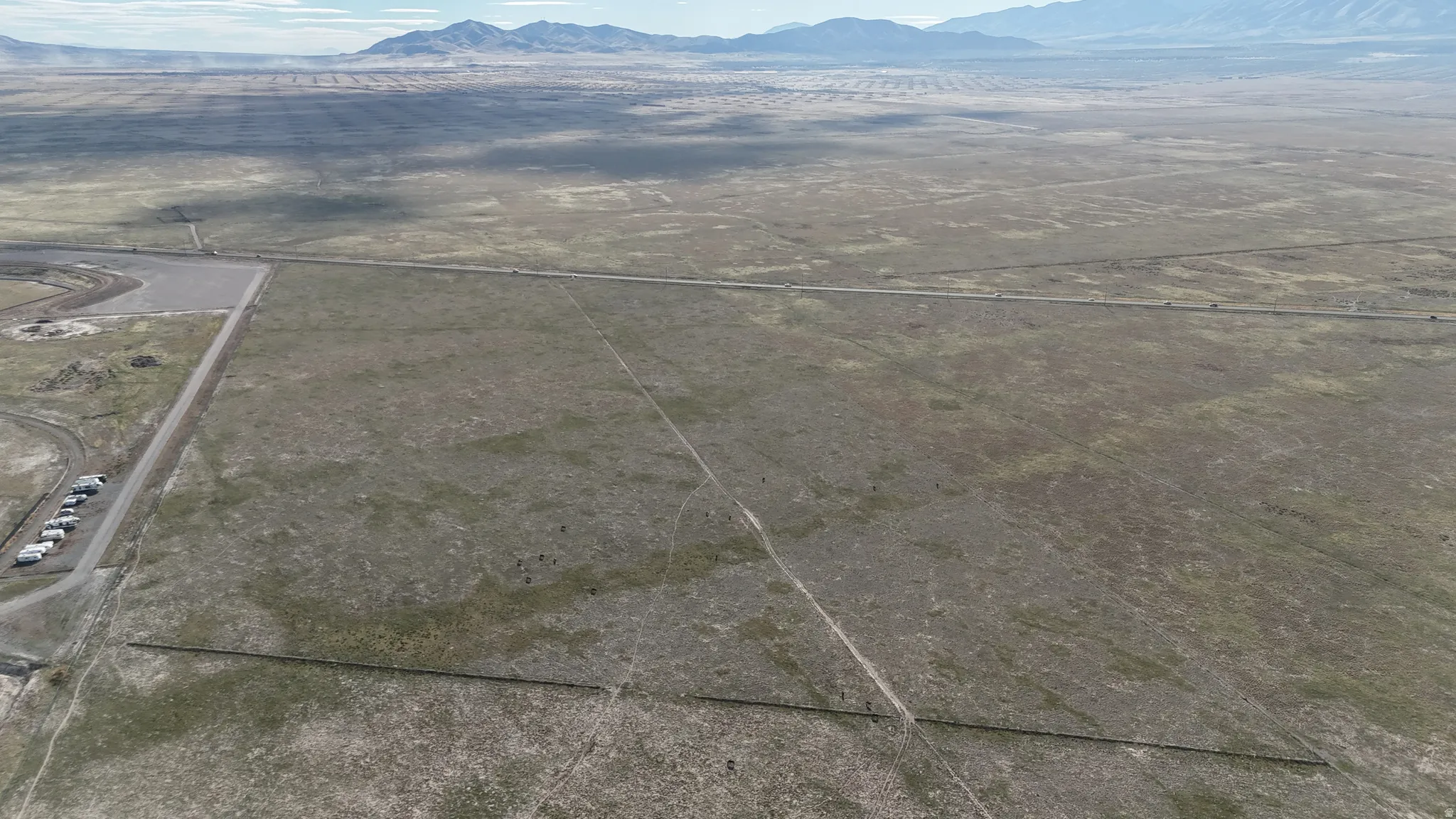 Aerial view of sparsely populated area with mountains