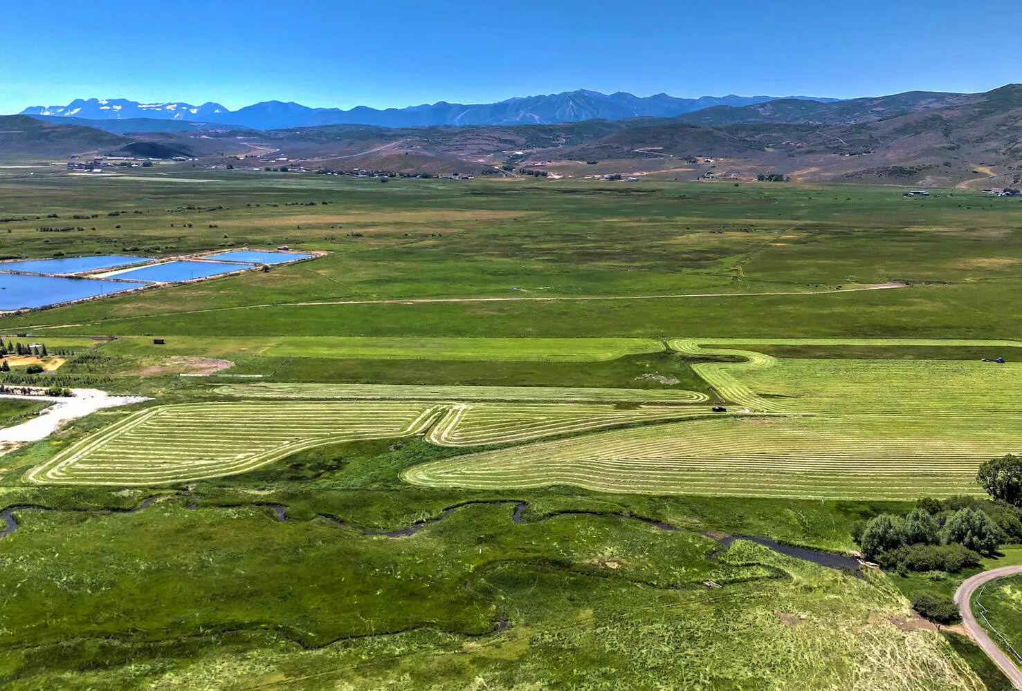 View of community featuring a water and mountain view