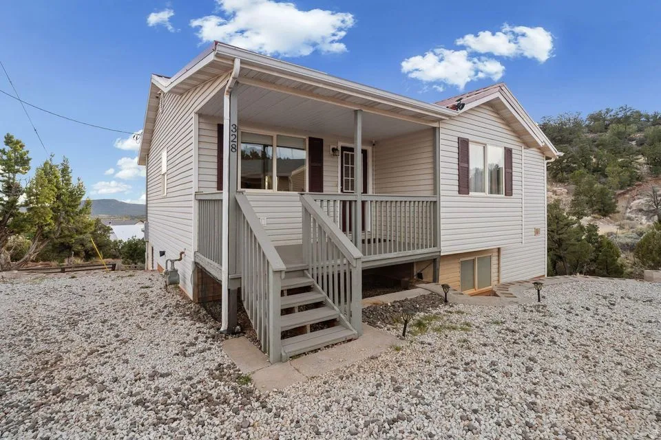 View of front of home featuring a mountain view