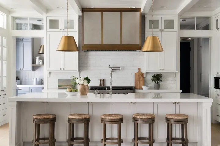 Kitchen featuring glass insert cabinets, white cabinetry, decorative backsplash, and beamed ceiling