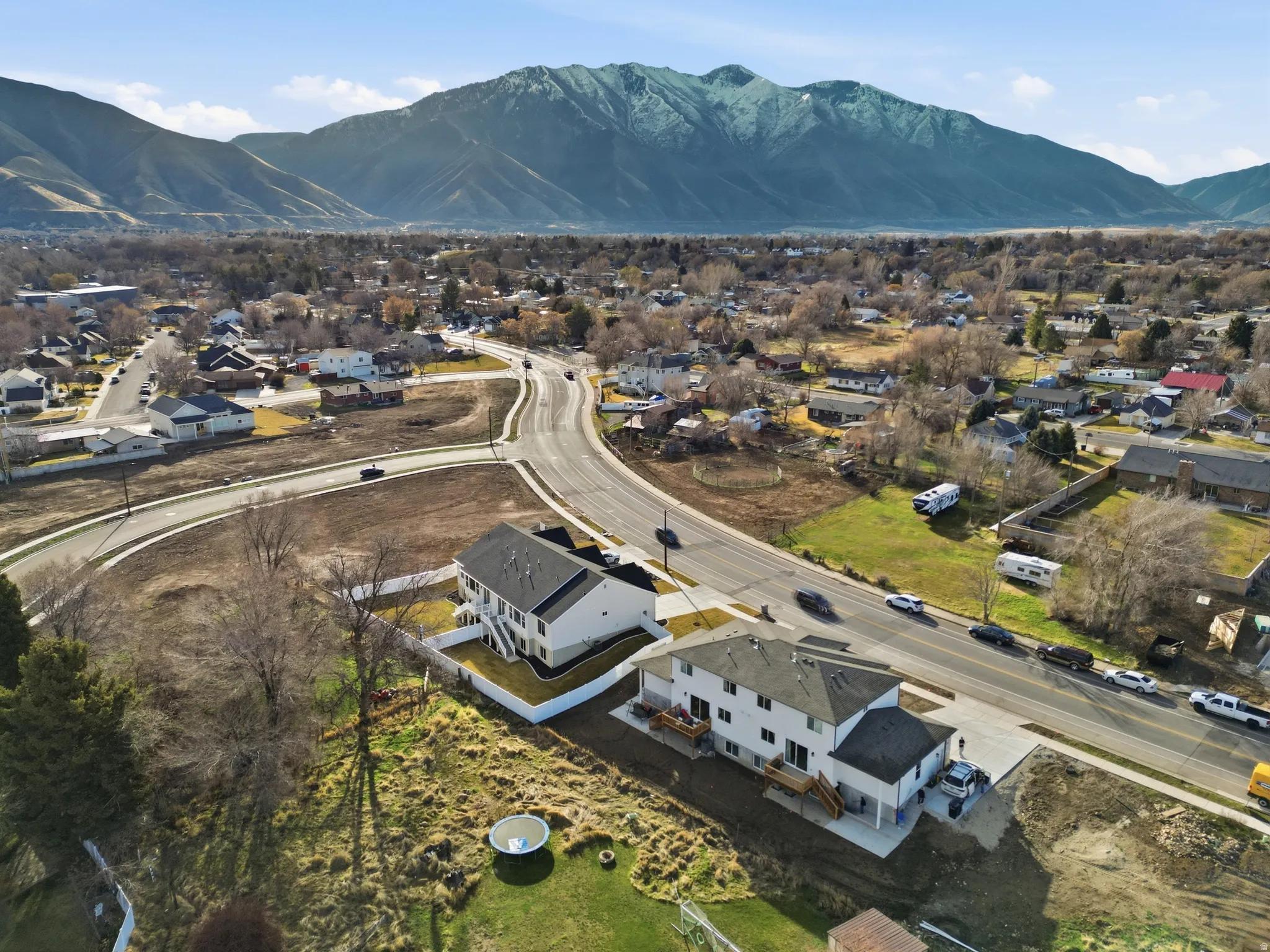 Aerial view of residential area with a mountain backdrop