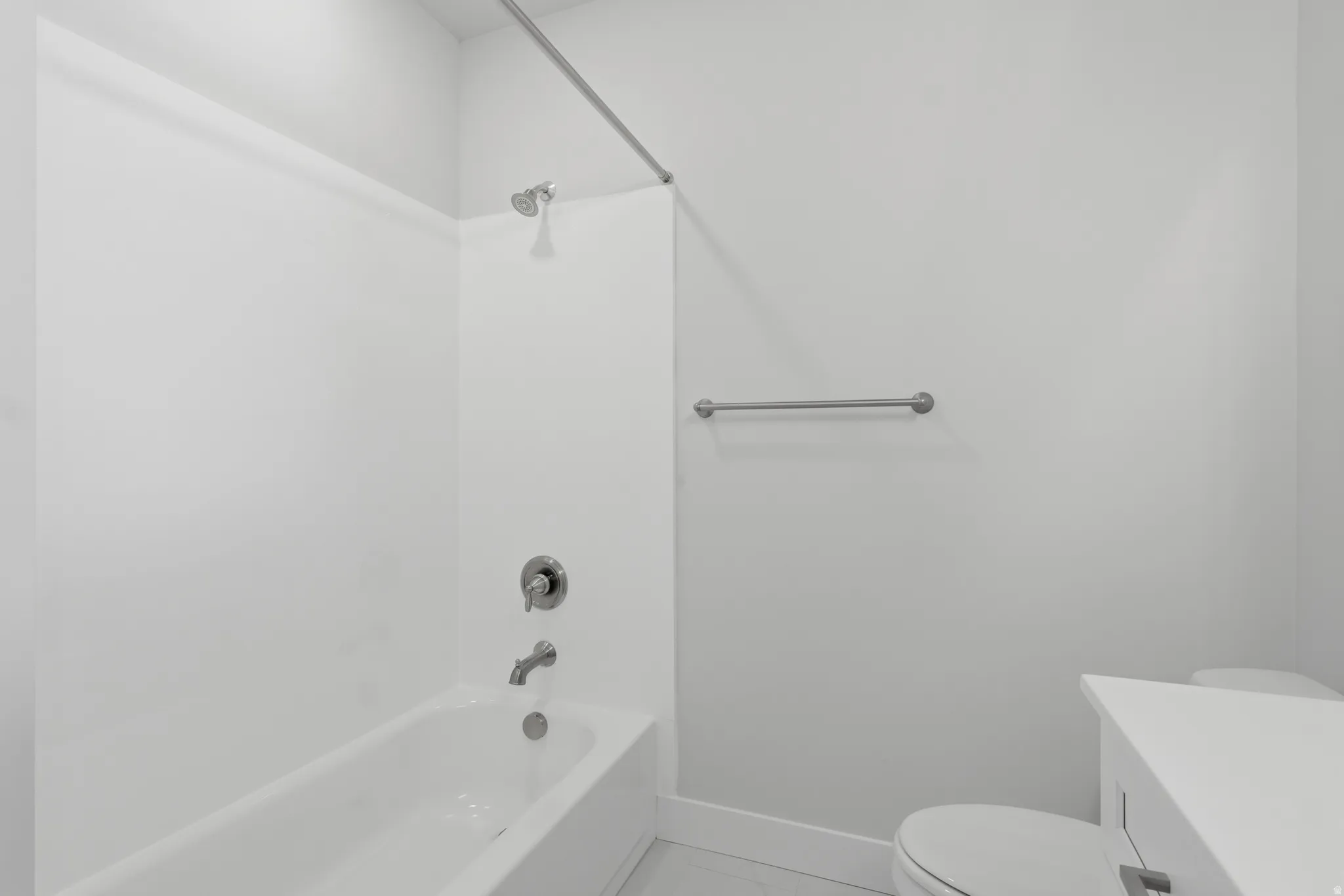 Full bathroom with vanity and  shower combination