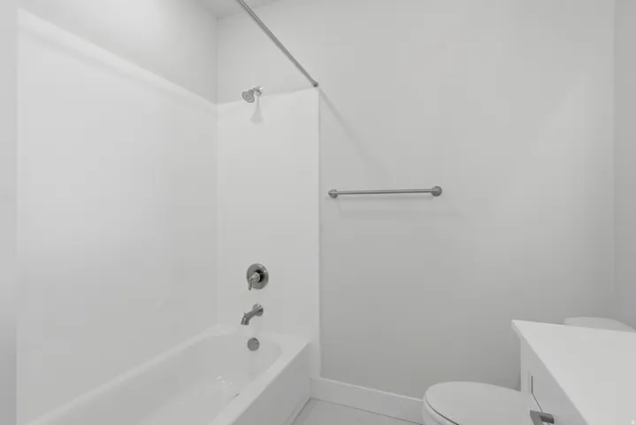 Full bathroom with vanity and  shower combination