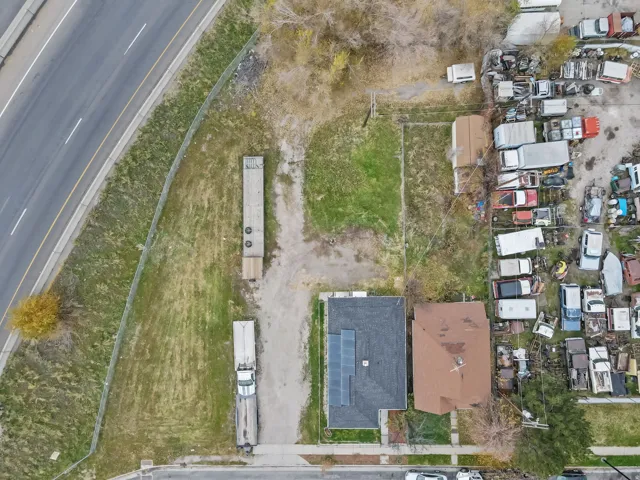 Aerial overview of property's location featuring nearby suburban area
