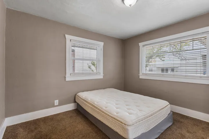 Bedroom featuring carpet