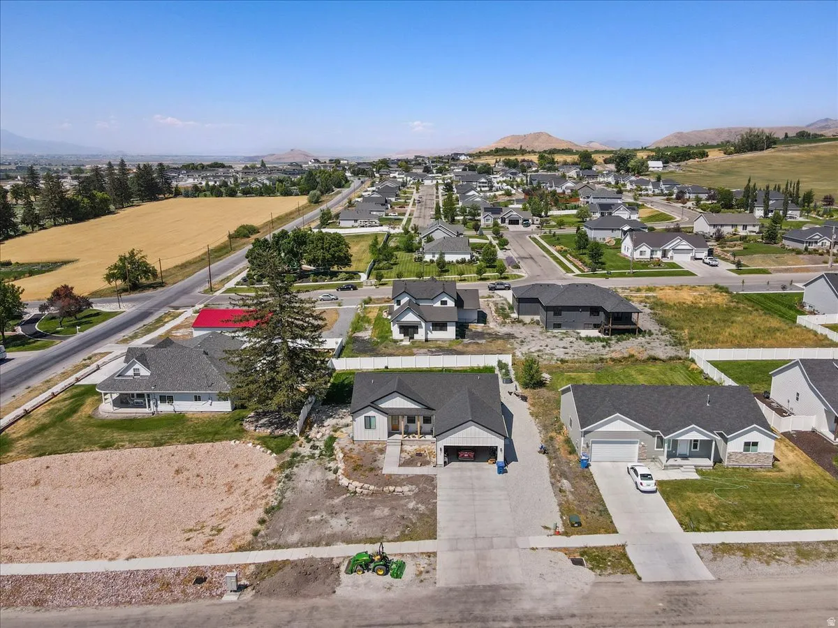 Aerial view of residential area with a mountain backdrop