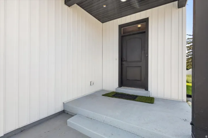 Property entrance with a porch