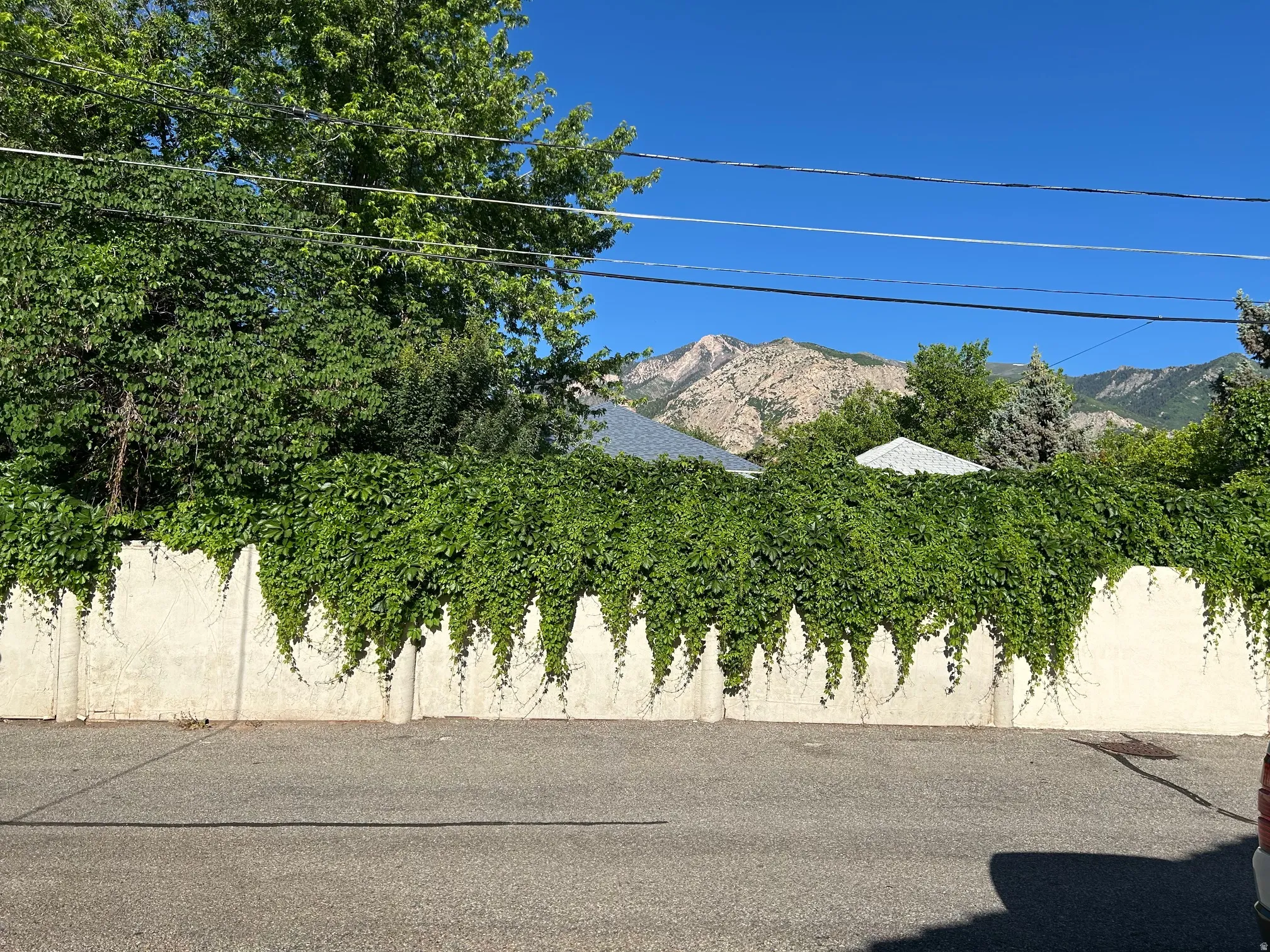 View of home's exterior with a mountain view