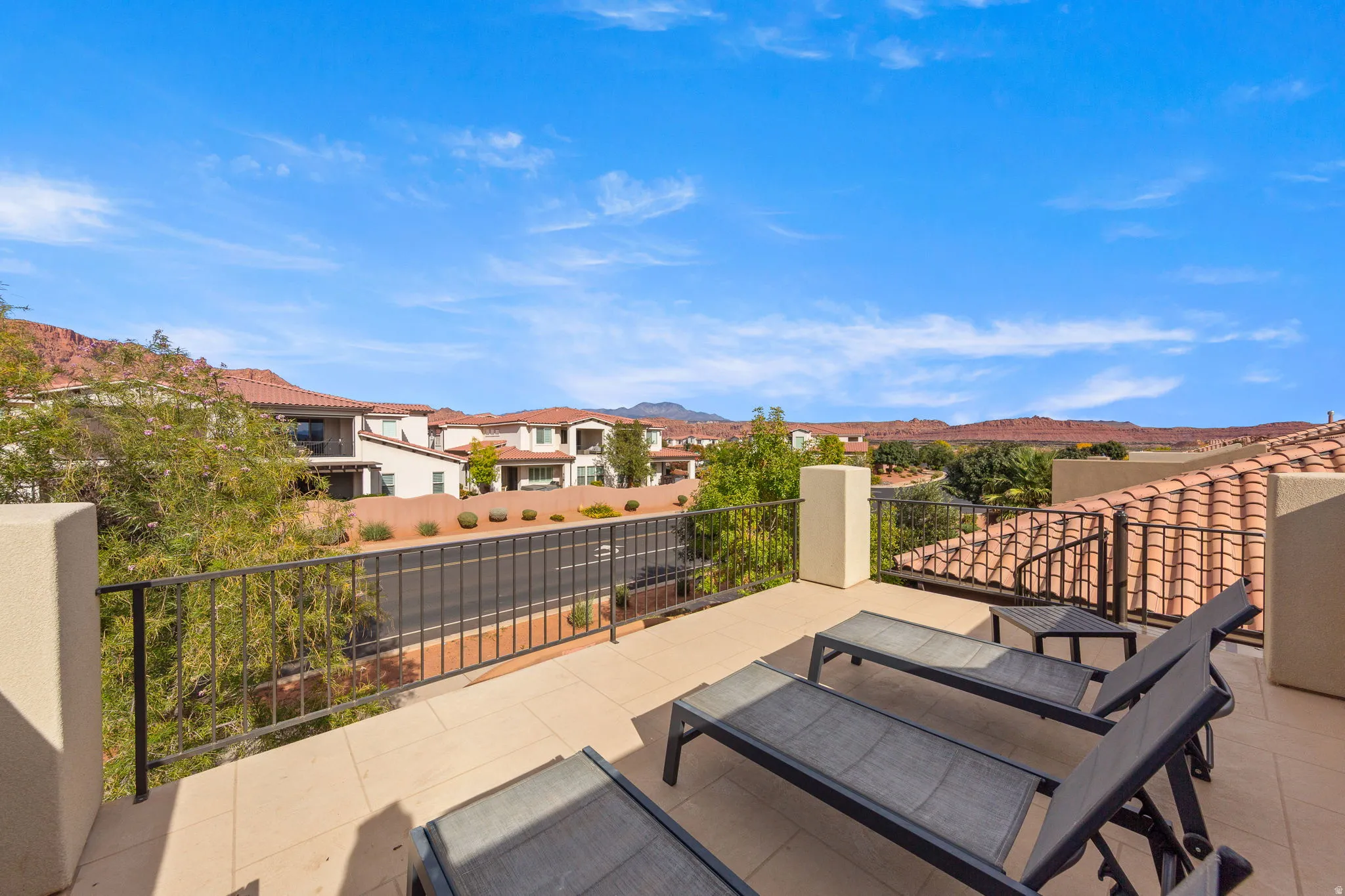 View of patio / terrace featuring a residential view and a mountain view