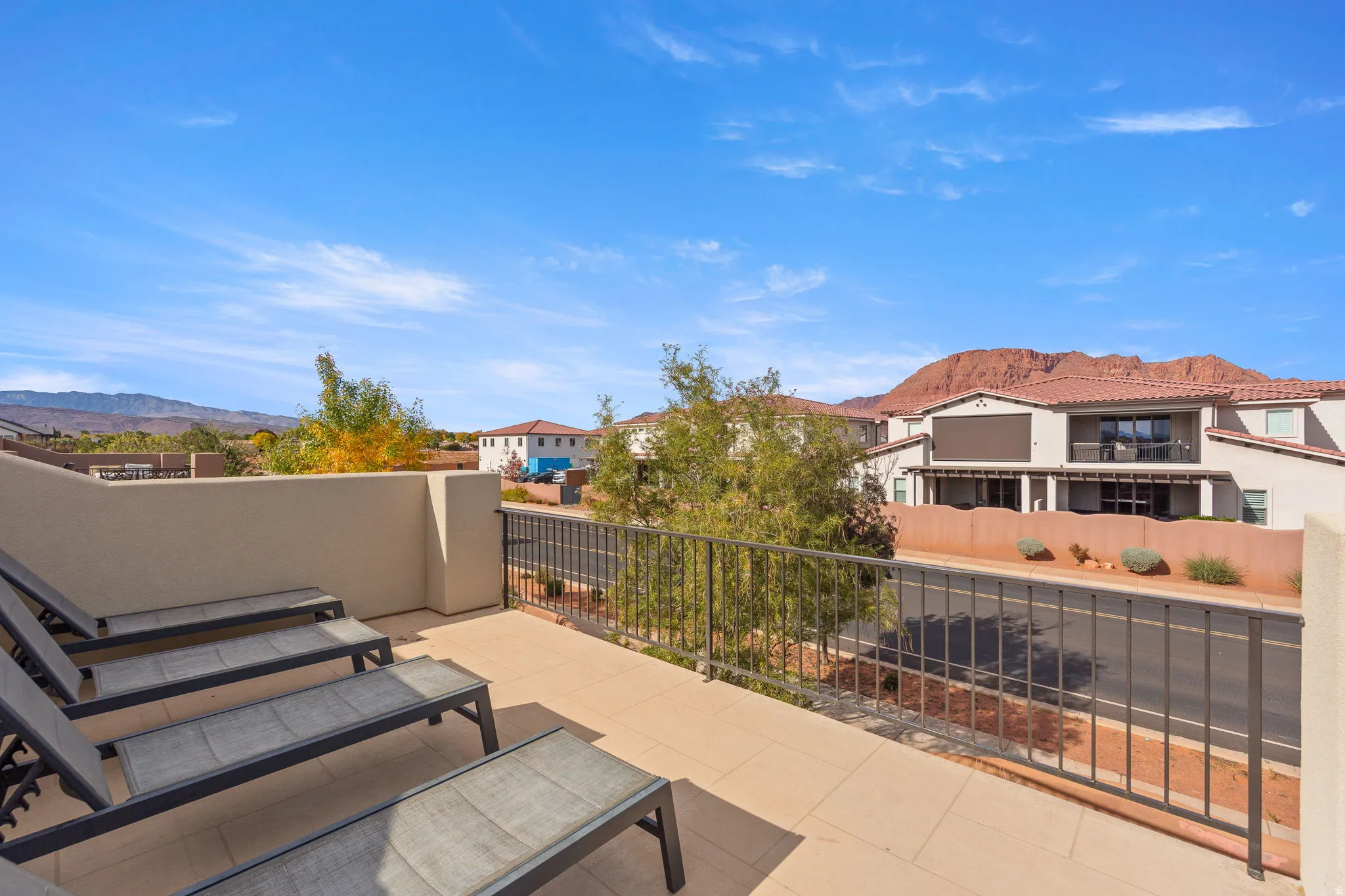 View of patio / terrace featuring a residential view and a mountain view