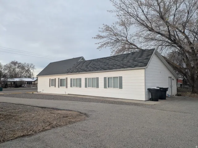 View of home's exterior featuring a shingled roof