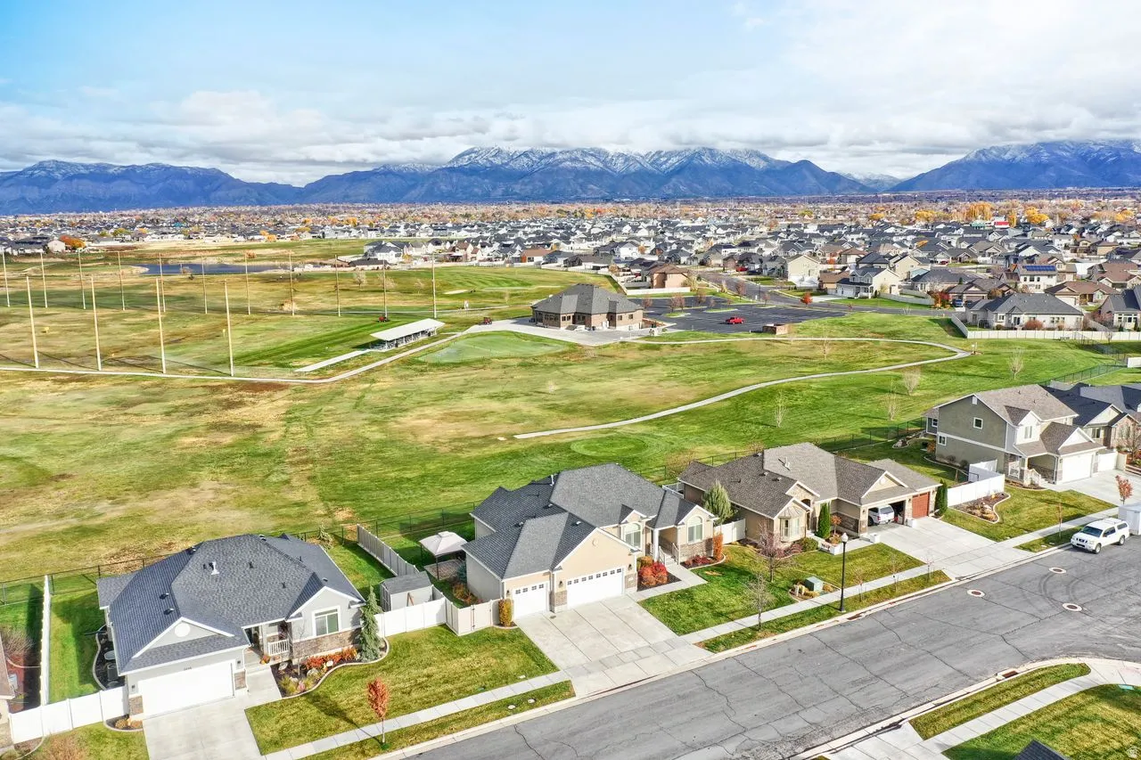 Aerial view of residential area featuring mountains