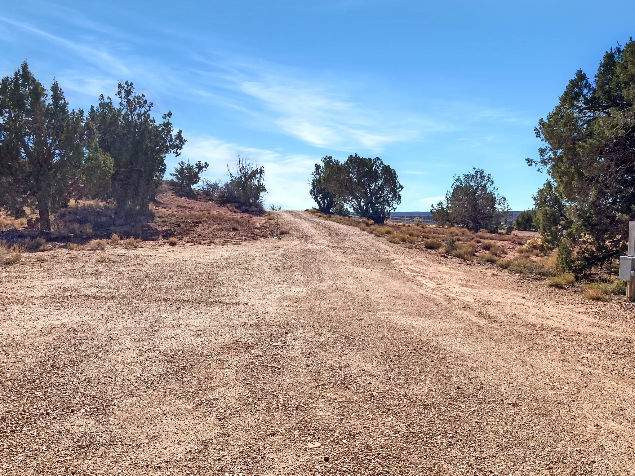 View of dirt / gravel road featuring a rural view