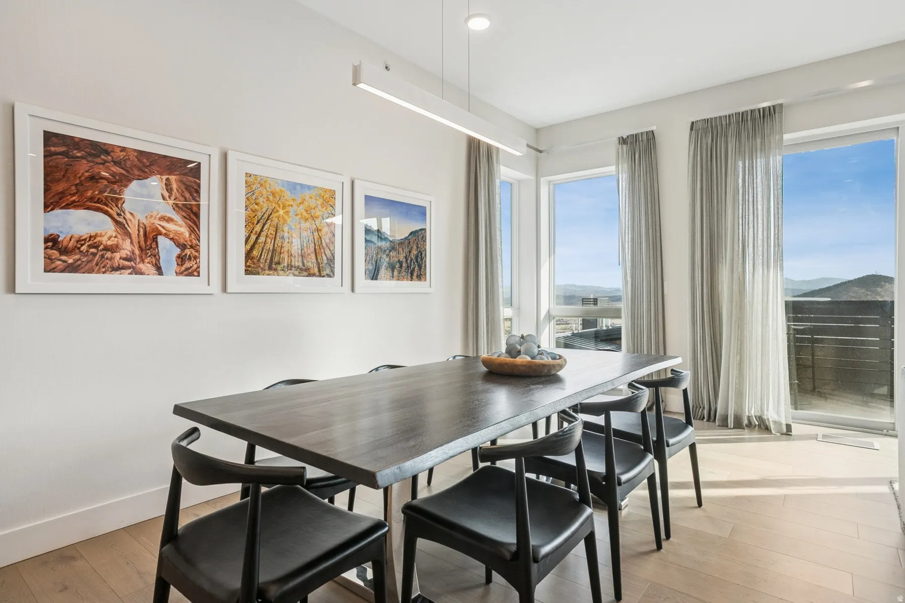 Dining room featuring light wood finished floors and recessed lighting