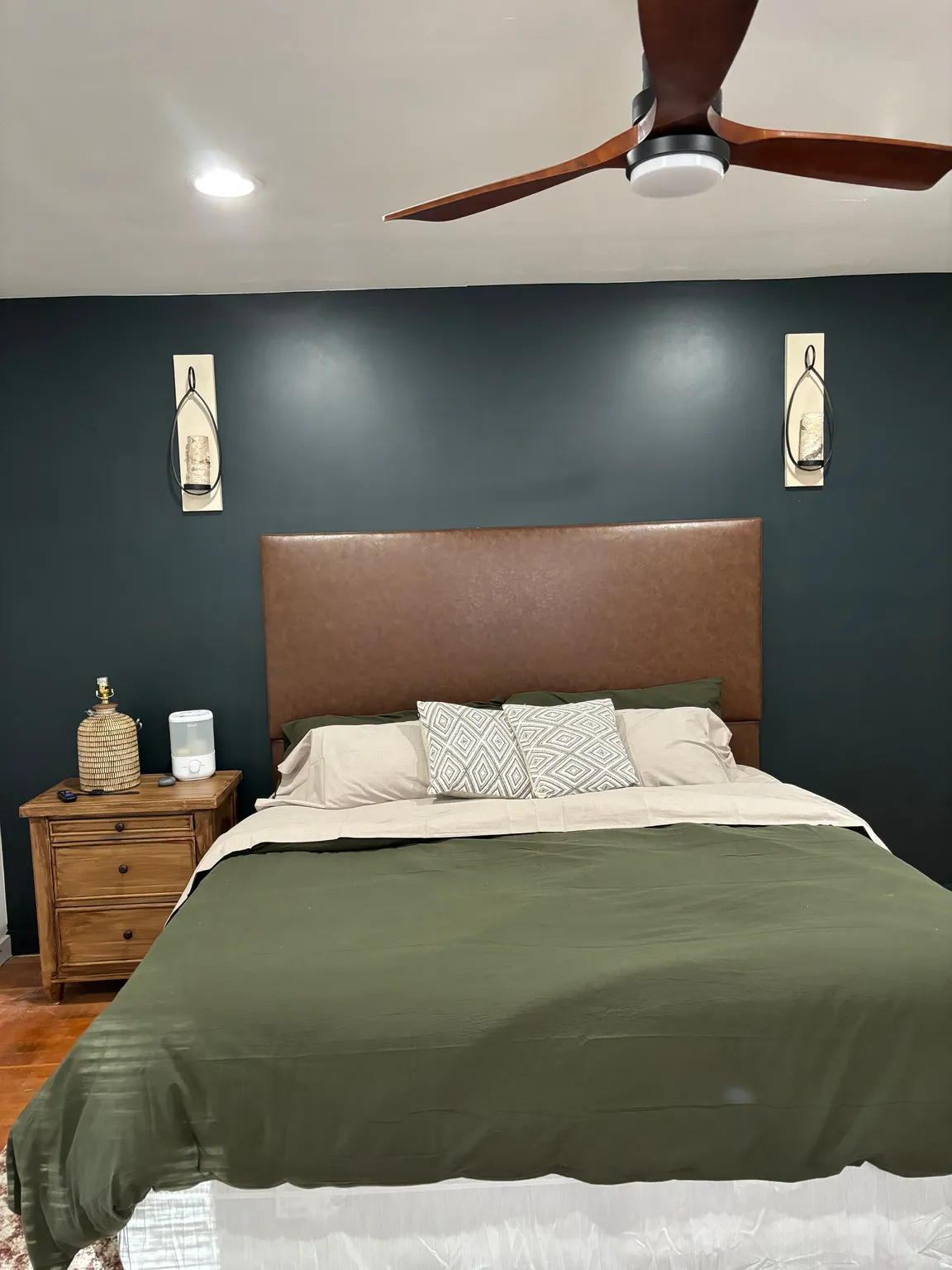 Bedroom with wood finished floors, ceiling fan, and recessed lighting