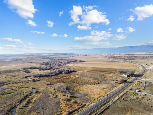 Overview of rural landscape with a mountain backdrop