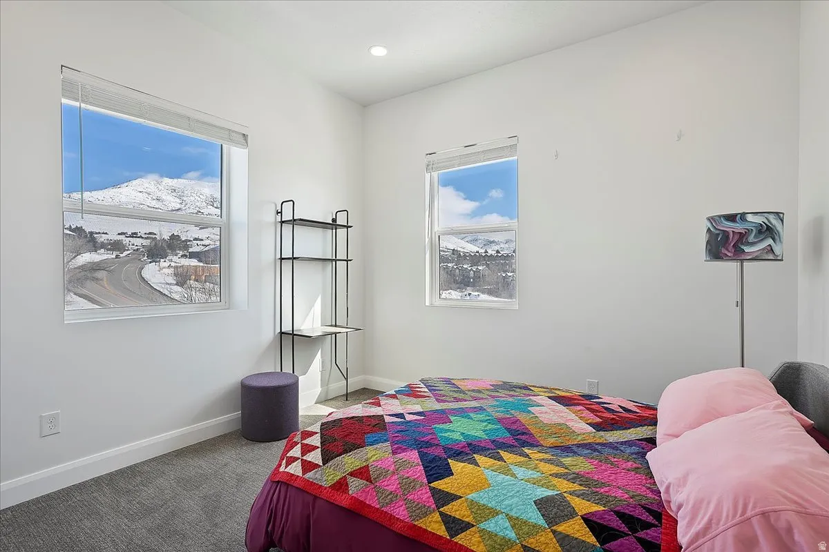 Bedroom featuring carpet and recessed lighting