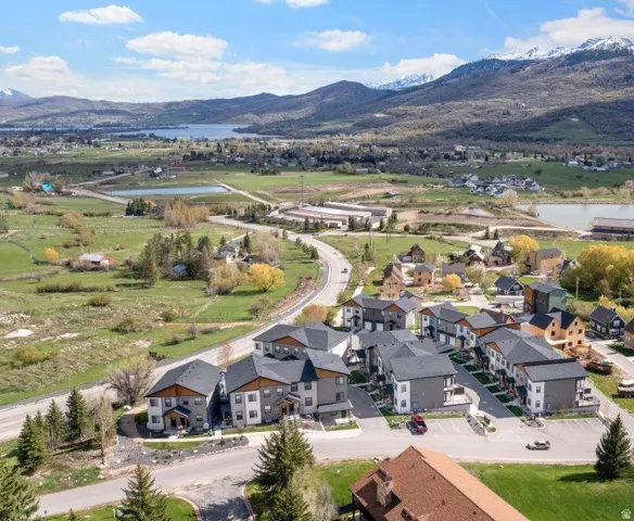 Aerial view of residential area with a water and mountain view