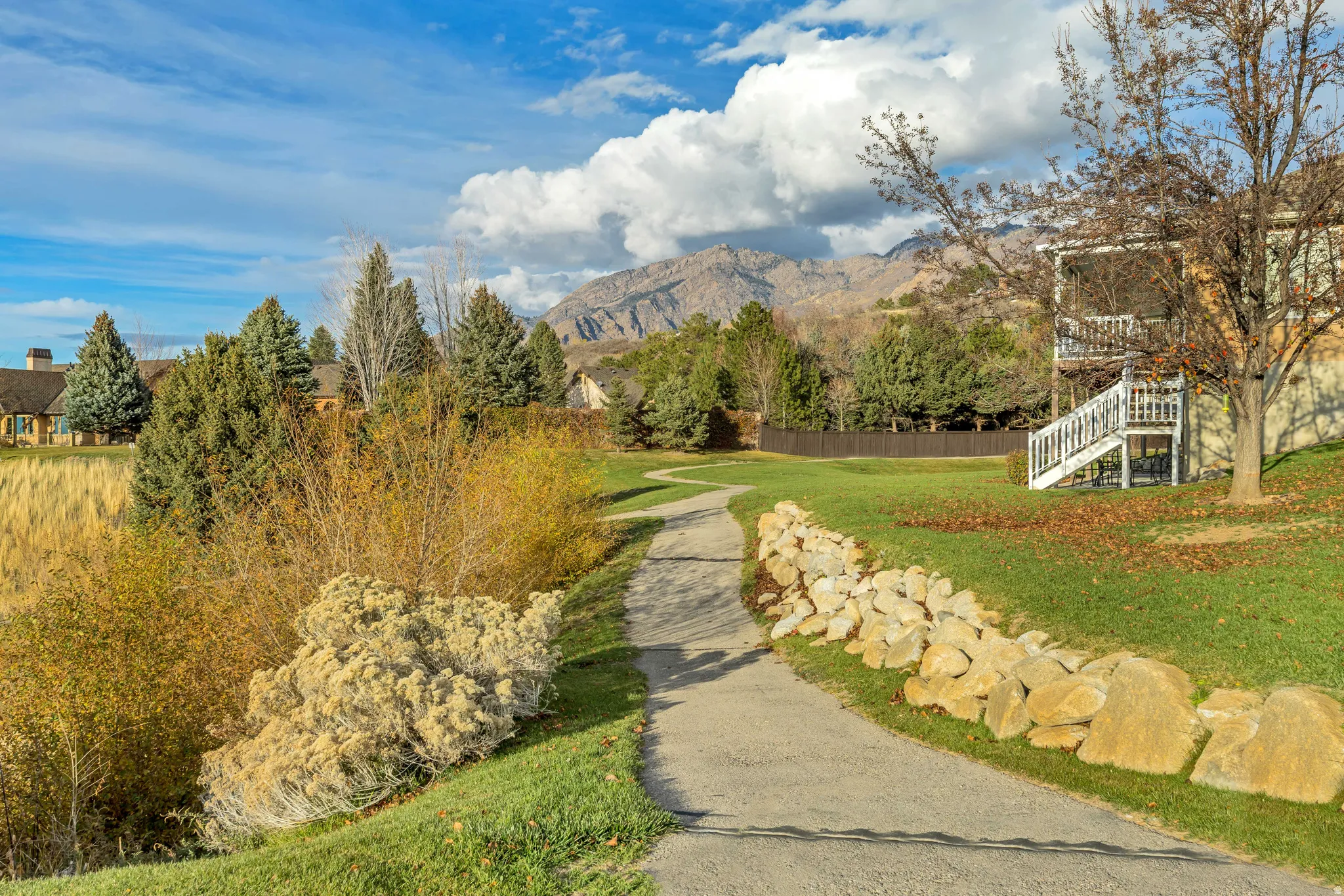Common Space - View of community featuring a mountain view and stairway