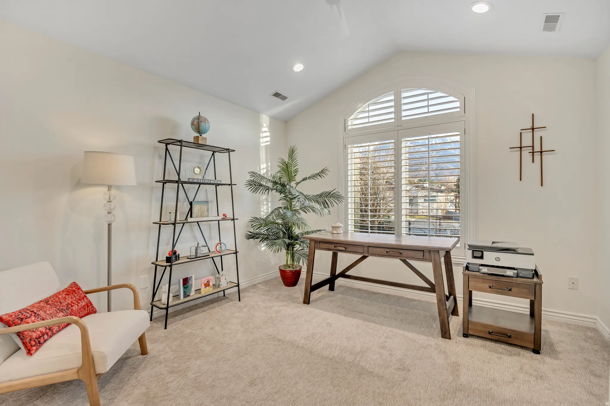 Second Level secondary bedroom with light carpet, vaulted ceiling, and recessed lighting