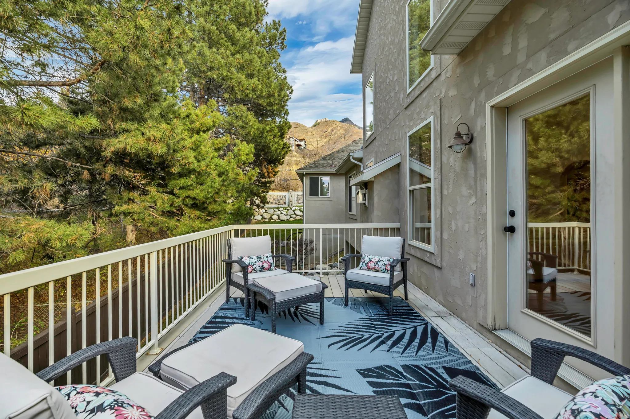 Wooden terrace featuring an outdoor living space