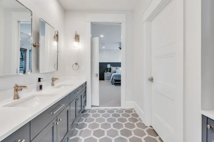 Bathroom with double vanity and ensuite bath