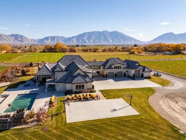 Overview of rural landscape featuring a mountain backdrop