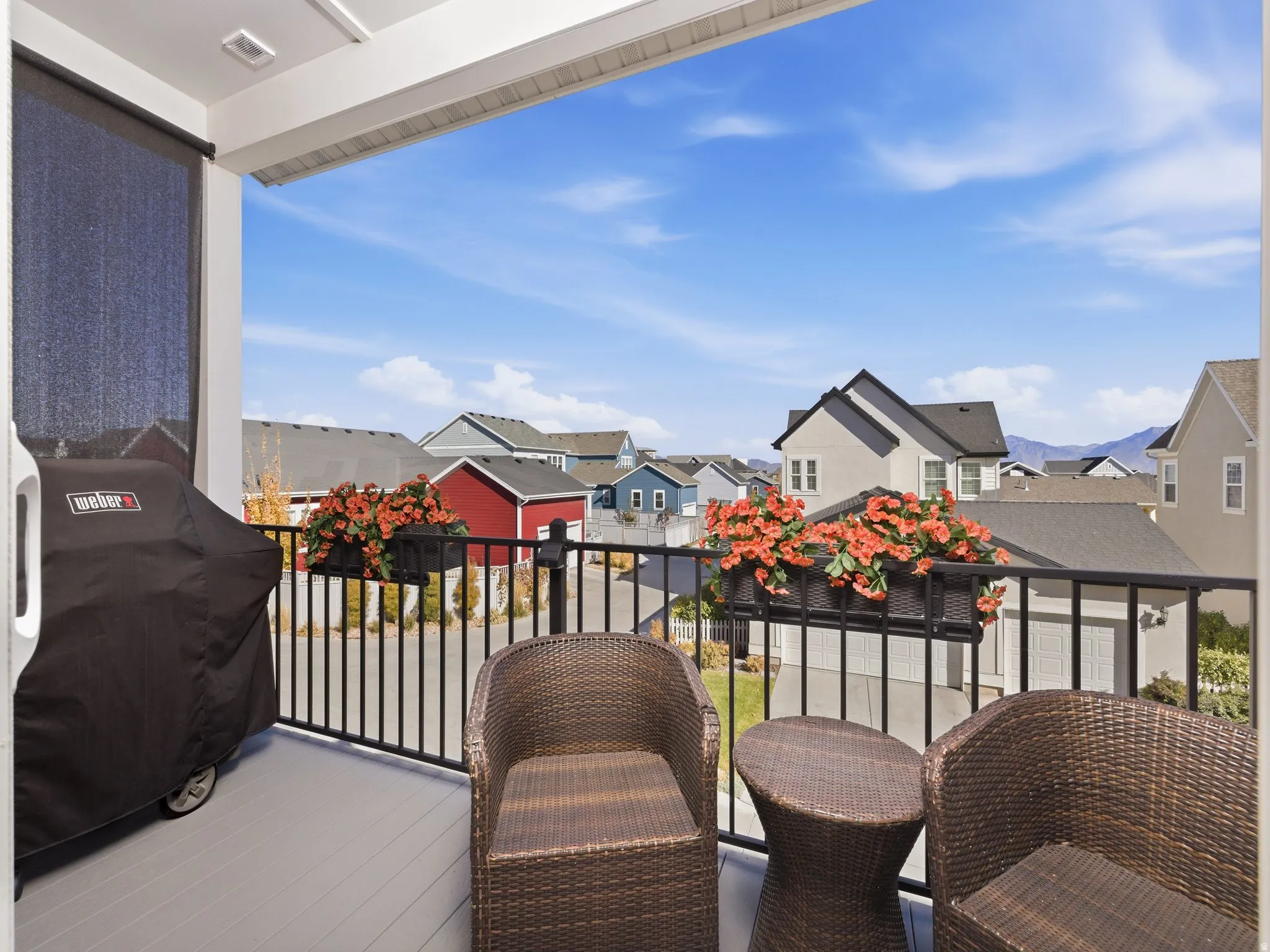Balcony featuring a residential view and a grill
